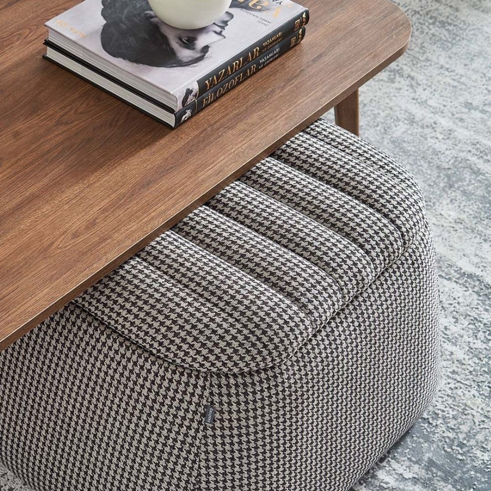 Chenille-Crowbar Tokyo Pouf under a table